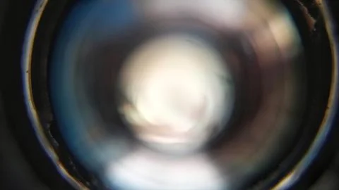 Light gradation on an out of focus camera lens Foto stock