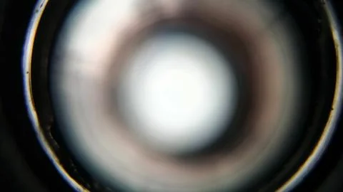 Light gradation on an out of focus camera lens Foto stock