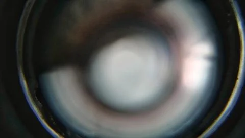 Light gradation on an out of focus camera lens Foto stock