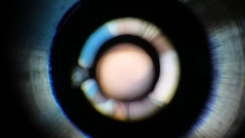 Light gradation on an out of focus camera lens. Stock Photos