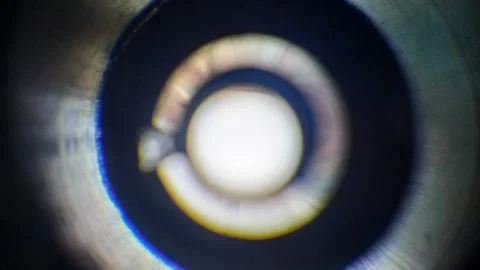 Light gradation on an out of focus camera lens. Foto stock