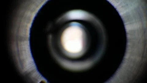 Light gradation on an out of focus camera lens. Stock Photos