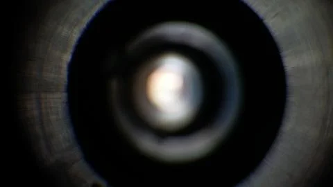 Light gradation on an out of focus camera lens. Stock Photos