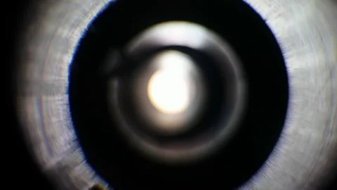 Light gradation on an out of focus camera lens. Stock Photos