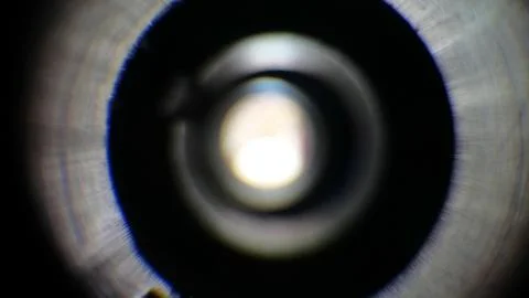 Light gradation on an out of focus camera lens. Stock Photos