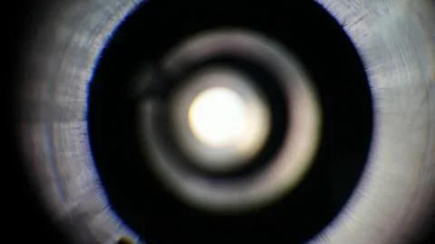 Light gradation on an out of focus camera lens. Stock Photos