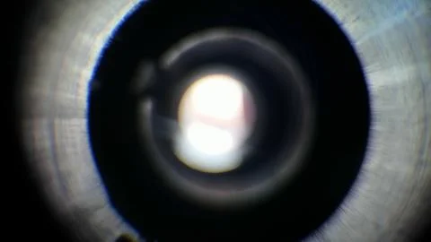 Light gradation on an out of focus camera lens. Stock Photos