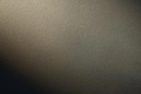 Light gradient on a grey cardboard background Stock Photos