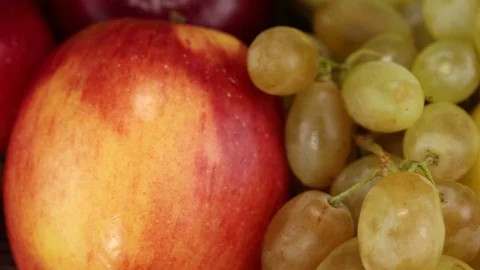 Light grapes and red apples Stock Footage 124193375
