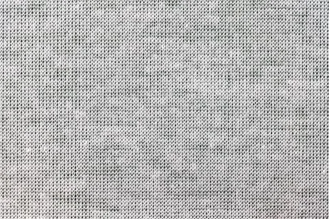 Light gray, background from a textile material. Fabric with natural texture. Stock Photos