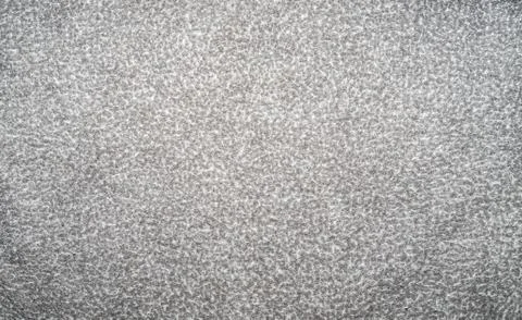 Light gray background with white specks. Background from gray matter Stock Photos