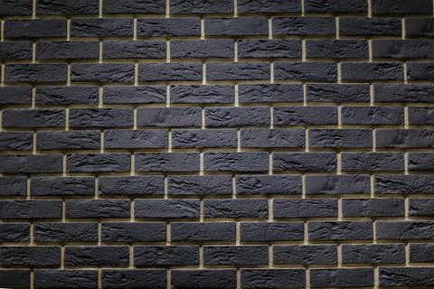 Light gray brick wall ,creative back-phonon closeup Stock Photos