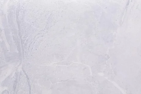 Light gray concrete surface with subtle texture and natural patterns for Stock Photos