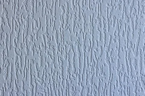 Light gray embossed texture closeup wavy surface Stock Photos
