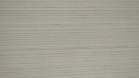 Light gray fabric, pattern with vertical stripes. Background close-up. Close- Stock Photos