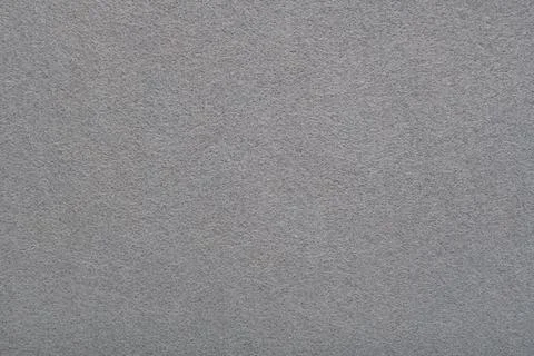 Light gray felt texture background - close-up of soft fabric surface. Stock Photos