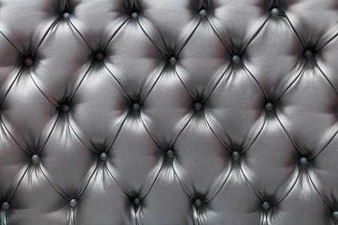 Light gray horizontal elegant leather texture with buttons for background and Stock Photos