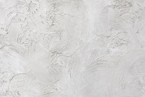 Light gray low contrast smooth decorative plaster background Stock Photos