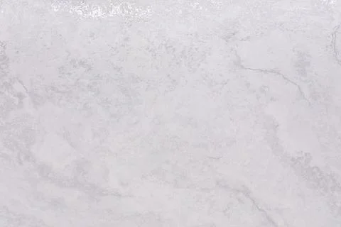 Light gray marble surface with subtle textures and patterns for home decor and Stock Photos