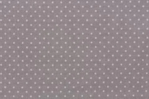 Light gray polka dot fabric texture background. Stock Photos
