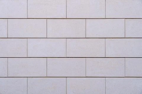 Light Gray Rectangular Stone Tile Wall Texture with Clean Grid Pattern Stock Photos