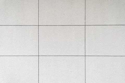 Light Gray Rectangular Tile Wall with Even Grid Joints Texture Stock Photos