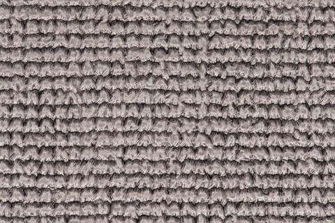 Light gray ribbed carpet texture background close up Stock Photos