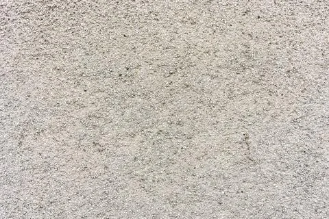 Light Gray Rough Cast Rendered Wall on Building with Speckled Gritty pattern Stock Photos