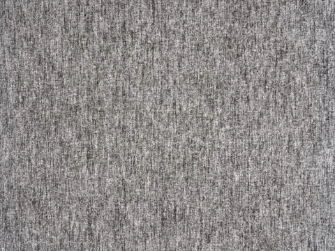 Light gray speckled fabric texture of blinds, the concept of the background o Stock Photos