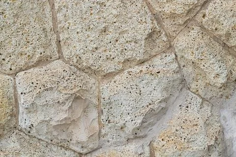 Light gray stone background uneven tiles with lines close-up Stock Photos