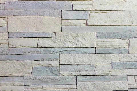 Light gray stone wall. horizontal architecture wallpaper Foto stock