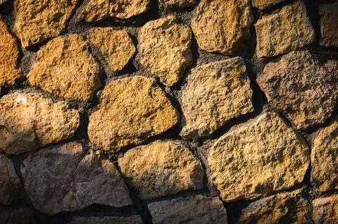 Light gray stone wall textured background Stock Photos