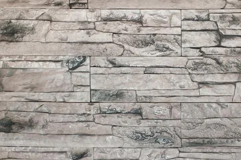 Light gray texture of a stone wall. Stock Photos