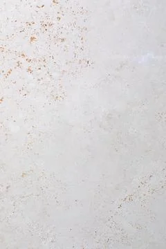Light gray textured surface showcases natural patterns and subtle imperfections Foto stock