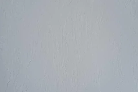 Light gray wall texture with decorative plaster Stock Photos