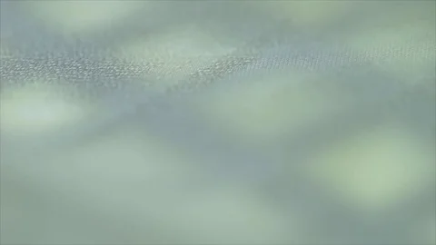 Light green abstract cloth, focus motion on green LED, 스톡 동영상 73754521