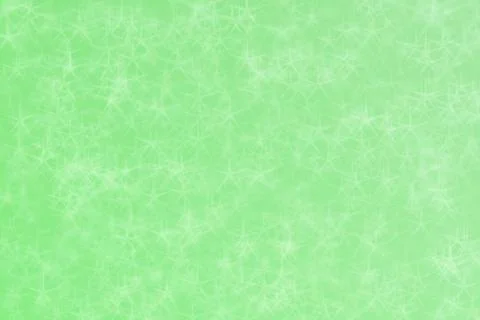Light green abstract defocused background, star shape bokeh pattern. Illustrazione stock