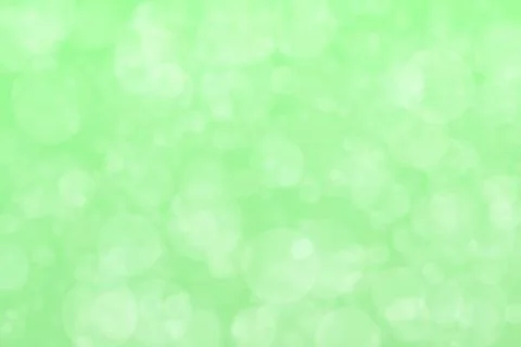 Light green abstract defocused background, circle shape bokeh pattern. イラスト素材