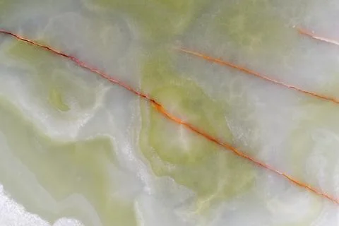 Light green blurred background made of green jade or Nephrite Stock Photos