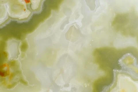 Light green blurred background made of green jade or Nephrite Stock Photos