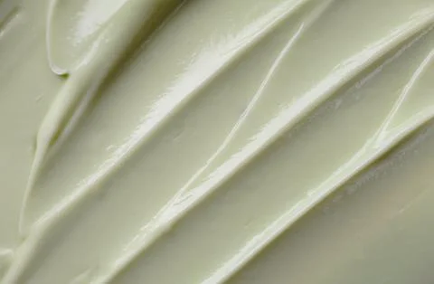 Light Green Cream Texture Background - Skincare Cream Stock Photos