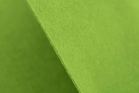 Light green felt background - close-up. Sample for a craft store. Stock Photos