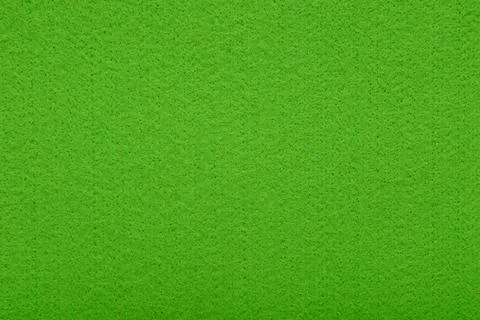 Light green felt texture background - close-up of soft fabric surface. Stock Photos