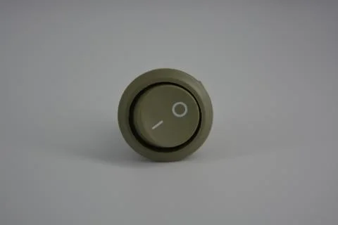 Light green plastic button for electronics, electrical engineering, electrics. Stock Photos