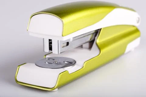 Light green stapler isolated on white Stock Photos