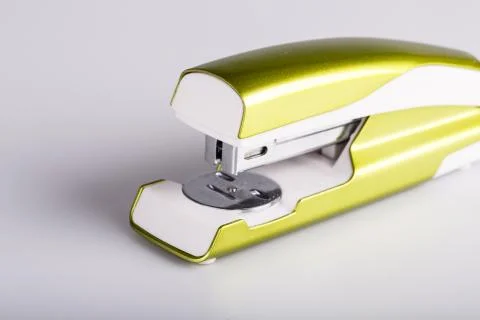Light green stapler Stock Photos