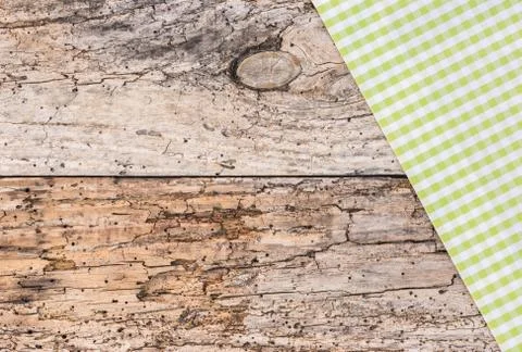 Light green tablecloth on old rustic wooden background Stock Photos