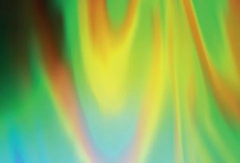 Light Green, Yellow vector blurred bright texture. Illustrazione stock
