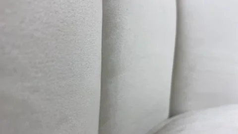 Light grey soft surface textured close up view on sofa couch. Home design Stock Footage 251282900