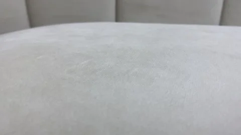 Light grey soft surface textured close up view on sofa couch. Home design Video stock 251283113